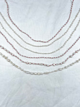 Load image into Gallery viewer, Pearl necklaces on Red Silk  | Ready To Ship
